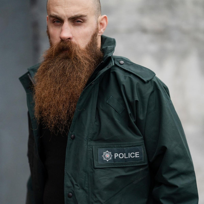 Uniforme de policía británico original Anorak impermeabilizan el impermeable verde sin forro verde